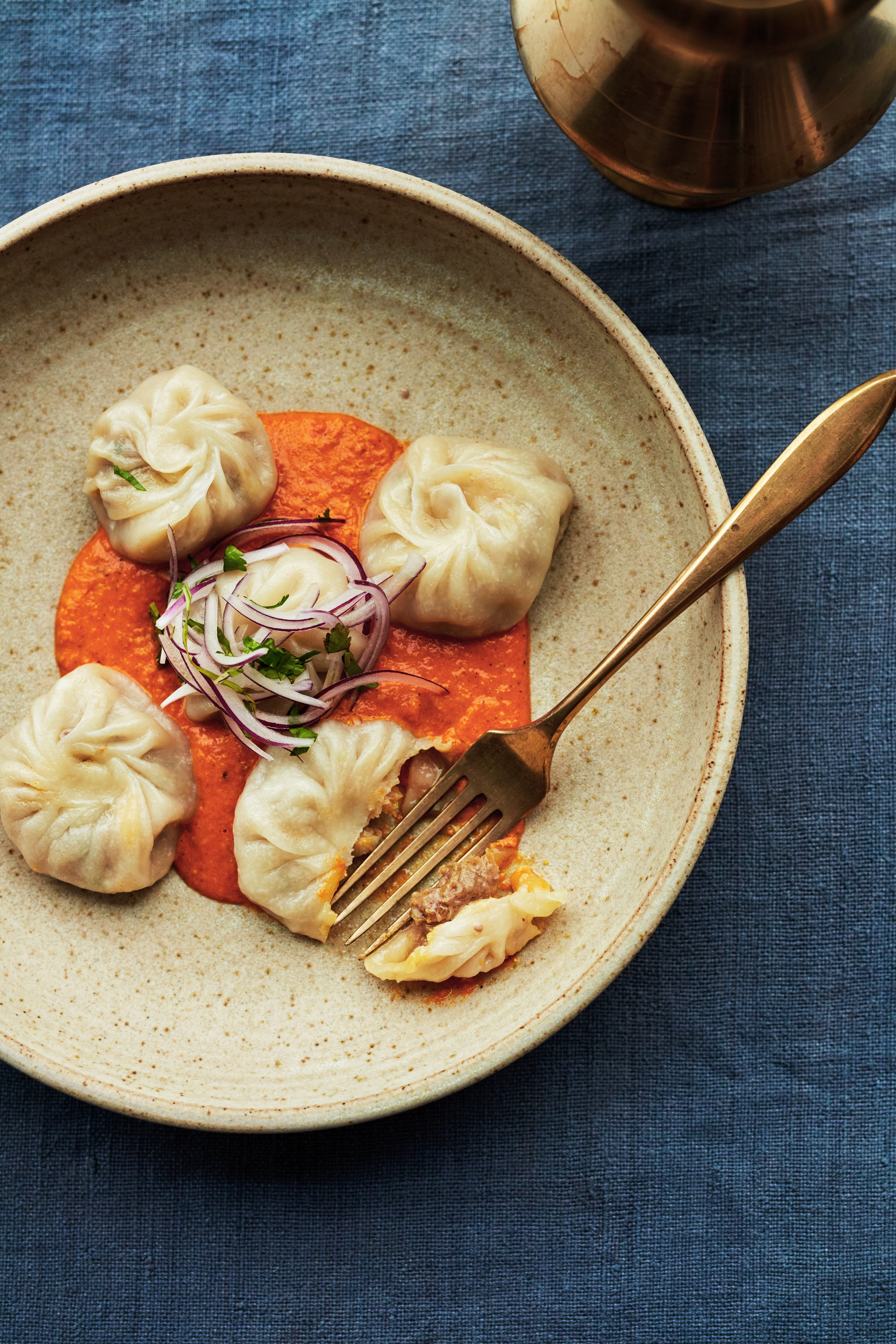 Kukhura ko momo - Steamed chicken momos with ginger &amp; chilli with a tomato sesame chutney